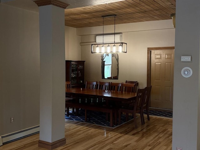 3 Wolf Rd, Bourne, MA 02532 - dining room featuring a baseboard heating unit, wood finished floors, wood ceiling, and ornate columns