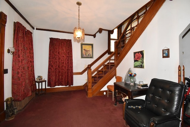 living area with crown molding, an inviting chandelier, and dark colored carpet