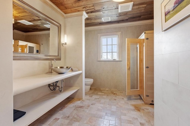 bathroom featuring visible vents, toilet, wood ceiling, and crown molding