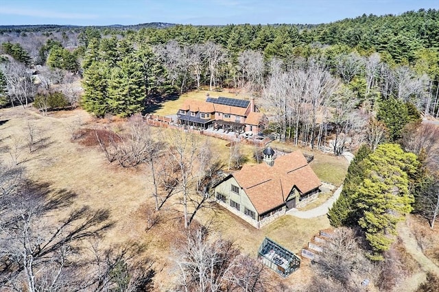 bird's eye view with a forest view