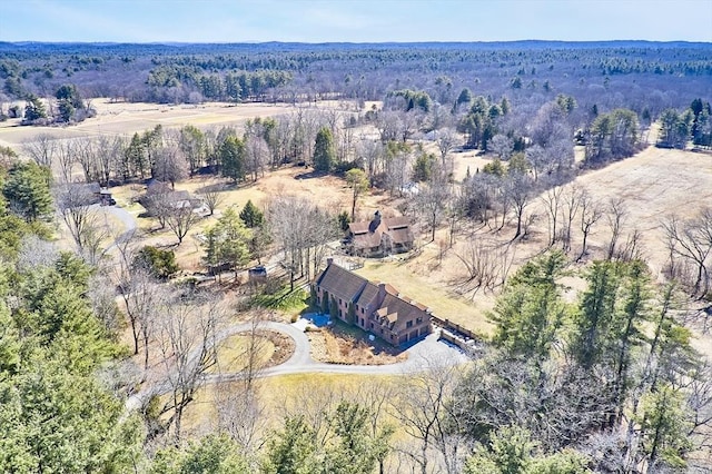 aerial view featuring a view of trees