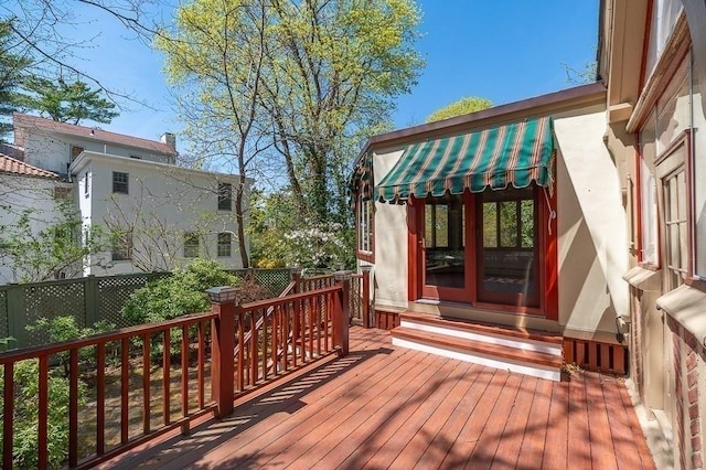 wooden deck featuring fence