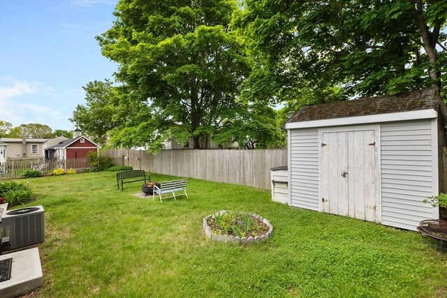 34 13th St, Wareham, MA 02532 - view of yard featuring a shed, an outbuilding, and central AC