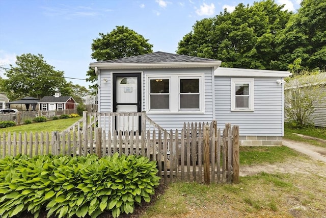 34 13th St, Wareham, MA 02532 - view of front of property with fence and a shingled roof