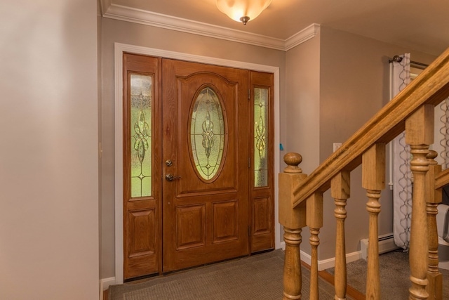 carpeted entrance foyer featuring crown molding