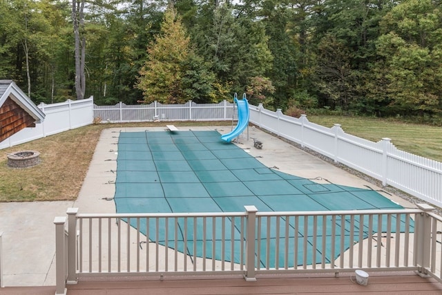 view of swimming pool featuring a patio area