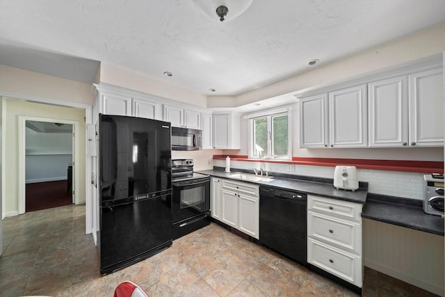 47 Pheasant Hill Rd, Weymouth, MA 02190 - kitchen with black appliances, dark countertops, white cabinets, and tasteful backsplash