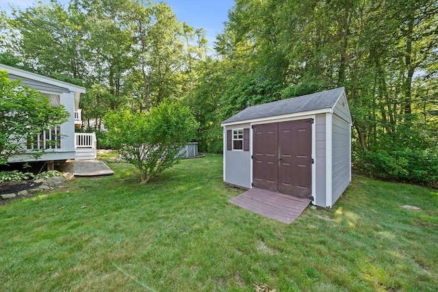 47 Pheasant Hill Rd, Weymouth, MA 02190 - view of grassy yard with a storage unit and a wooden deck