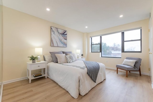 bedroom featuring light hardwood / wood-style flooring