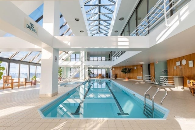 view of pool featuring a skylight