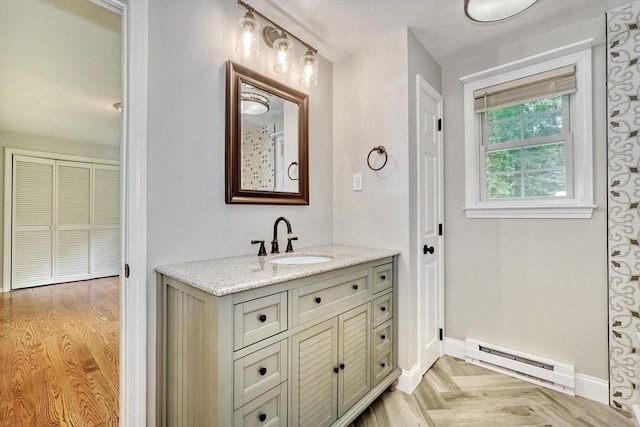 47 Key St Unit 47, Millis, MA 02054 - full bathroom featuring baseboard heating and vanity