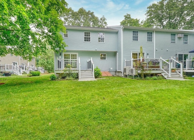 47 Key St Unit 47, Millis, MA 02054 - back of house with a deck and a yard
