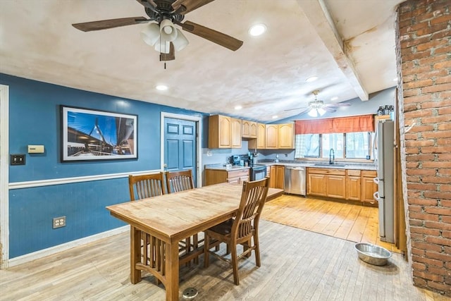 dining area featuring lofted ceiling with beams, recessed lighting, a wainscoted wall, a ceiling fan, and light wood-style floors