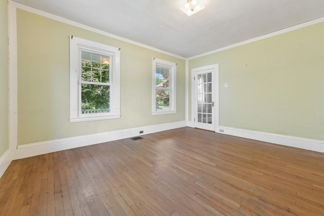 120 Readville St, Boston, MA 02136 - empty room featuring baseboards, wood-type flooring, and crown molding