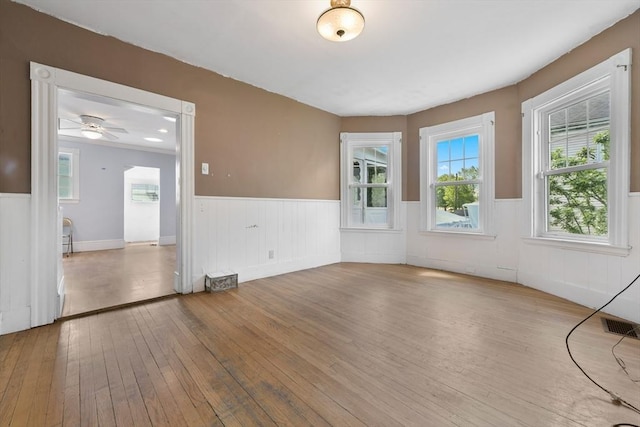 120 Readville St, Boston, MA 02136 - spare room featuring wainscoting, hardwood / wood-style flooring, and ceiling fan