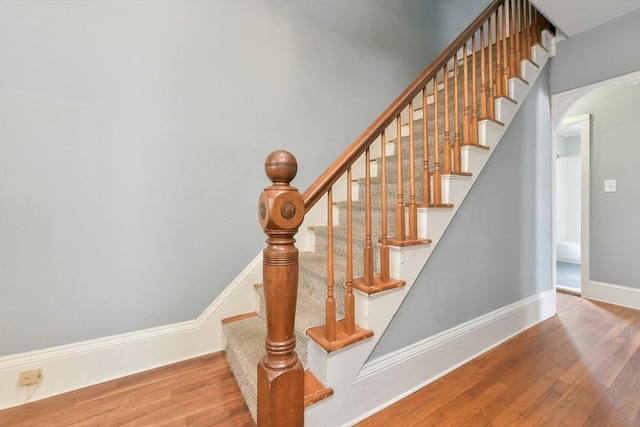 120 Readville St, Boston, MA 02136 - stairs with arched walkways, wood finished floors, and baseboards