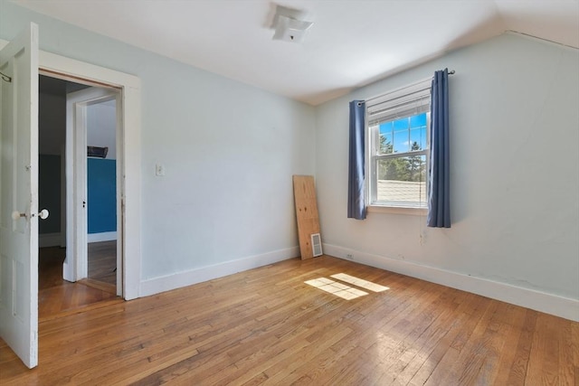 120 Readville St, Boston, MA 02136 - unfurnished room with light wood-type flooring, baseboards, and vaulted ceiling