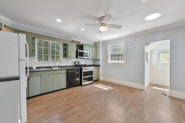 120 Readville St, Boston, MA 02136 - kitchen featuring appliances with stainless steel finishes, green cabinetry, crown molding, open shelves, and a sink