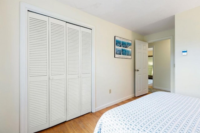 94 Pine View Dr, Brewster, MA 02631 - bedroom with light wood-style floors and a closet