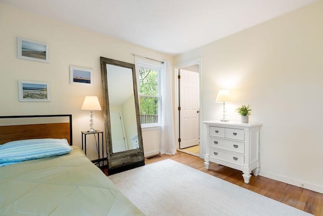 94 Pine View Dr, Brewster, MA 02631 - bedroom with wood finished floors and baseboards