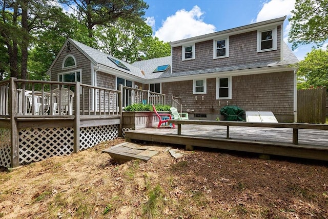 94 Pine View Dr, Brewster, MA 02631 - rear view of house featuring a deck and roof with shingles