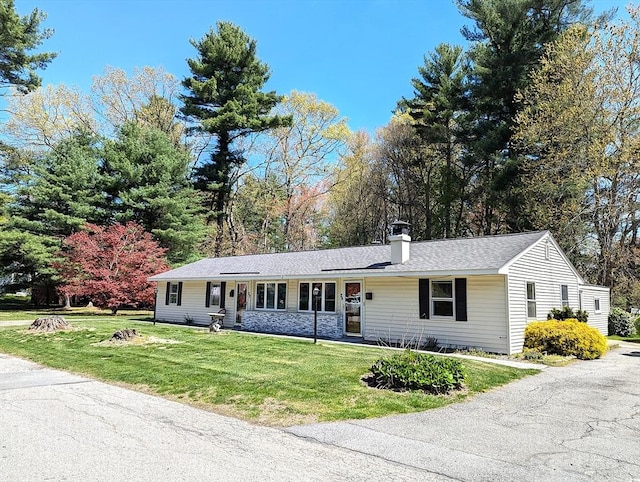 22-24 Newton Ave, Tewksbury, MA 01876 - ranch-style home with a chimney, a front lawn, and stone siding