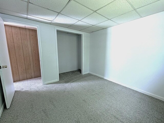 22-24 Newton Ave, Tewksbury, MA 01876 - unfurnished bedroom featuring carpet, a drop ceiling, baseboards, and a closet