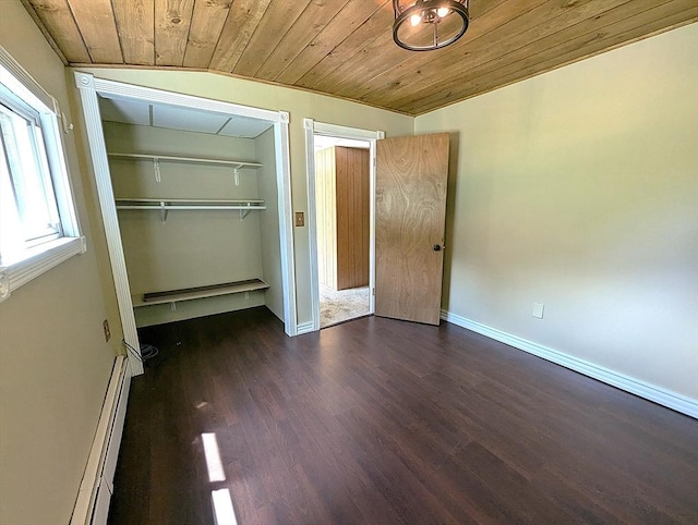 22-24 Newton Ave, Tewksbury, MA 01876 - unfurnished bedroom featuring wood ceiling, a baseboard heating unit, dark wood-style flooring, a closet, and baseboards