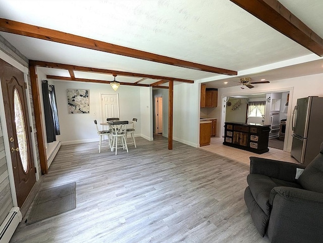 22-24 Newton Ave, Tewksbury, MA 01876 - living area featuring baseboard heating, beamed ceiling, light wood-style flooring, baseboards, and ceiling fan