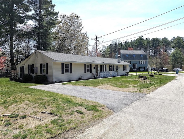 22-24 Newton Ave, Tewksbury, MA 01876 - view of front of house with a front lawn