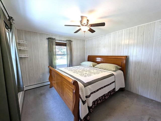 22-24 Newton Ave, Tewksbury, MA 01876 - carpeted bedroom featuring baseboard heating, wooden walls, and ceiling fan