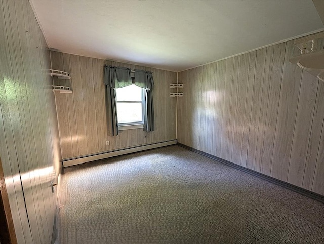 22-24 Newton Ave, Tewksbury, MA 01876 - unfurnished room with wooden walls, carpet flooring, and baseboard heating