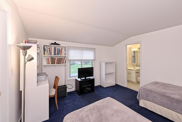 1 Astra Unit 1, Wayland, MA 01778 - bedroom with vaulted ceiling, carpet flooring, and ensuite bath
