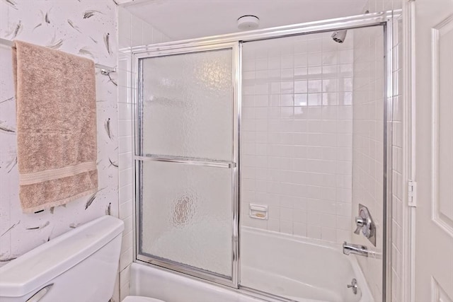 1 Astra Unit 1, Wayland, MA 01778 - full bath featuring toilet and shower / bath combination with glass door