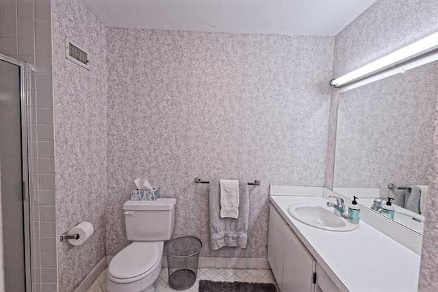 1 Astra Unit 1, Wayland, MA 01778 - full bathroom featuring tile patterned flooring, vanity, toilet, and an enclosed shower