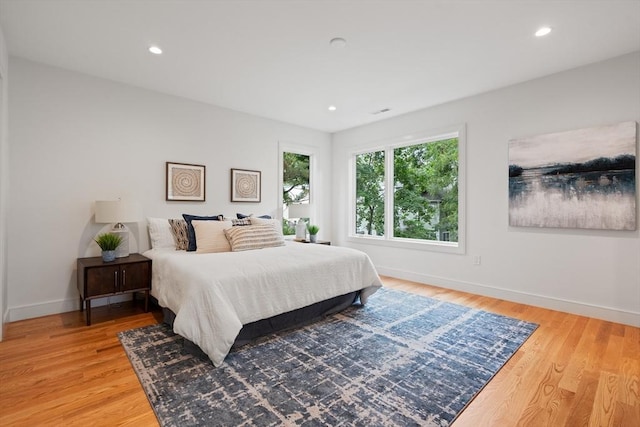 110 Harvard St, Newton, MA 02460 - bedroom featuring light wood-style flooring, baseboards, and recessed lighting