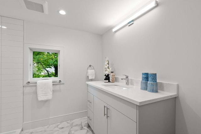 110 Harvard St, Newton, MA 02460 - bathroom featuring visible vents, baseboards, recessed lighting, vanity, and marble finish floor