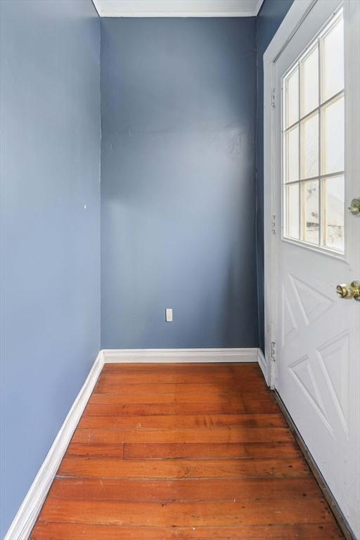 doorway to outside featuring dark hardwood / wood-style floors