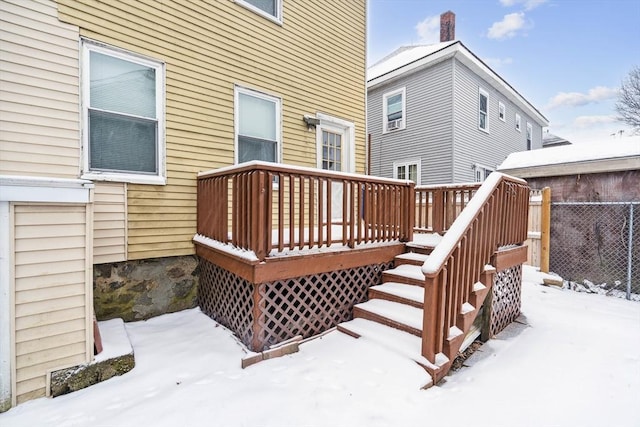 view of snow covered deck