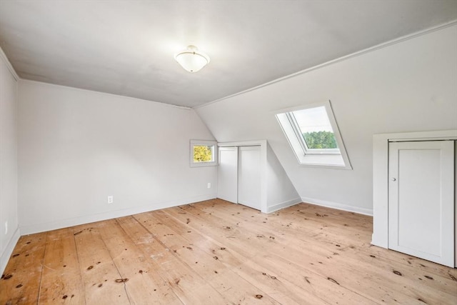 79 Wapping Rd, Kingston, MA 02364 - additional living space with a skylight, hardwood / wood-style floors, lofted ceiling, and baseboards