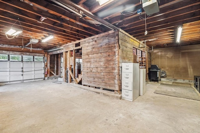 79 Wapping Rd, Kingston, MA 02364 - garage featuring a wood stove