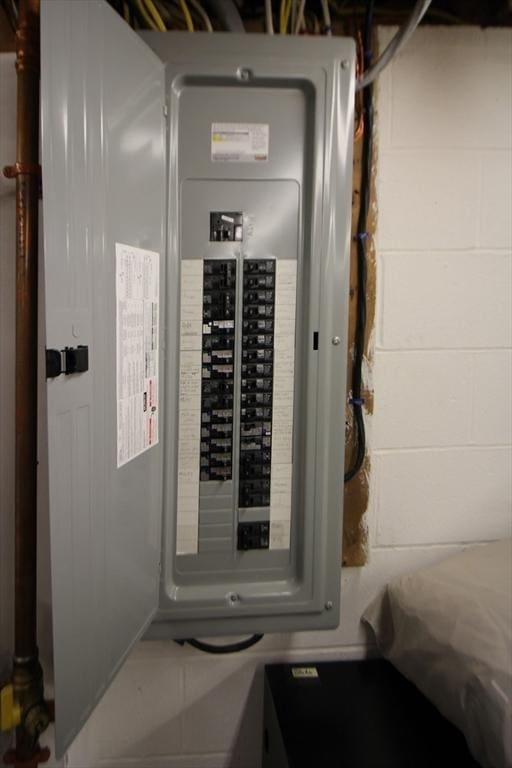 utility room featuring electric panel