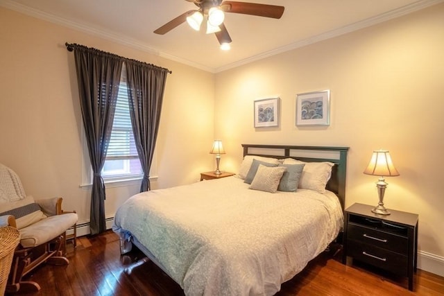 bedroom featuring wood finished floors, ornamental molding, a ceiling fan, and baseboards