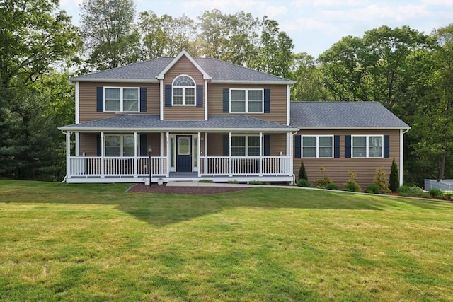 66 Eagle Dr, Dudley, MA 01571 - colonial-style house featuring a porch, a front lawn, and a shingled roof