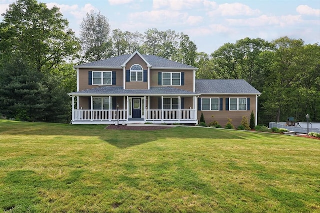 66 Eagle Dr, Dudley, MA 01571 - colonial inspired home with a front lawn and a porch