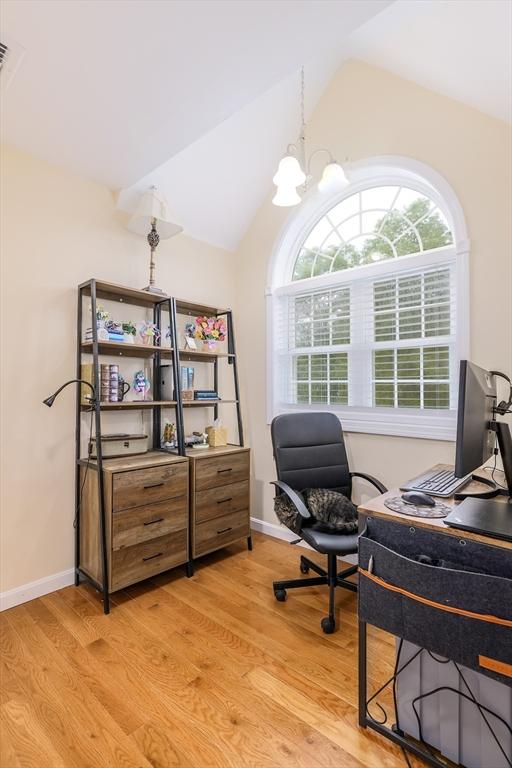 66 Eagle Dr, Dudley, MA 01571 - office area featuring lofted ceiling, light wood finished floors, a chandelier, and baseboards