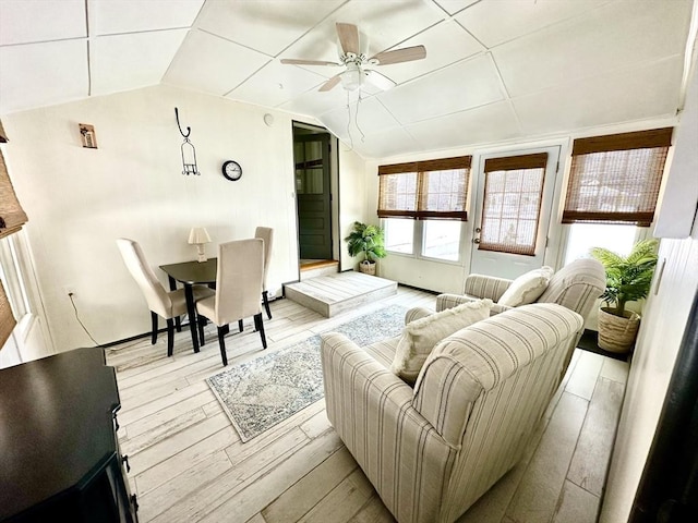 interior space featuring vaulted ceiling and ceiling fan