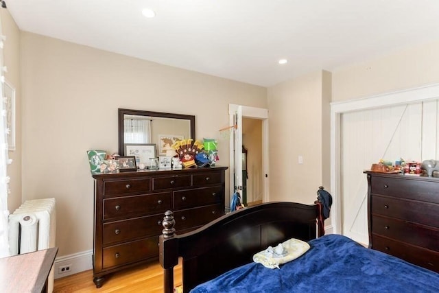 29-31 Bancroft Ave, Reading, MA 01867 - bedroom with radiator, light wood-type flooring, and recessed lighting