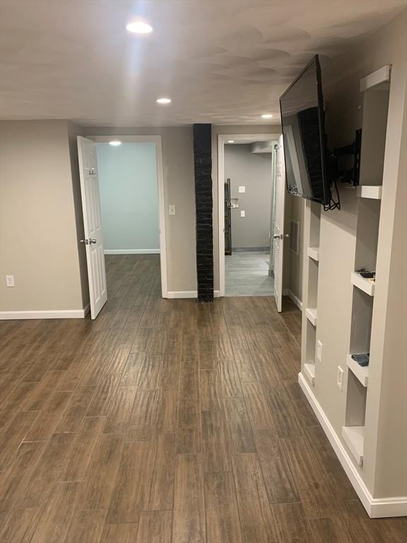 29-31 Bancroft Ave, Reading, MA 01867 - finished basement featuring dark wood-type flooring and recessed lighting