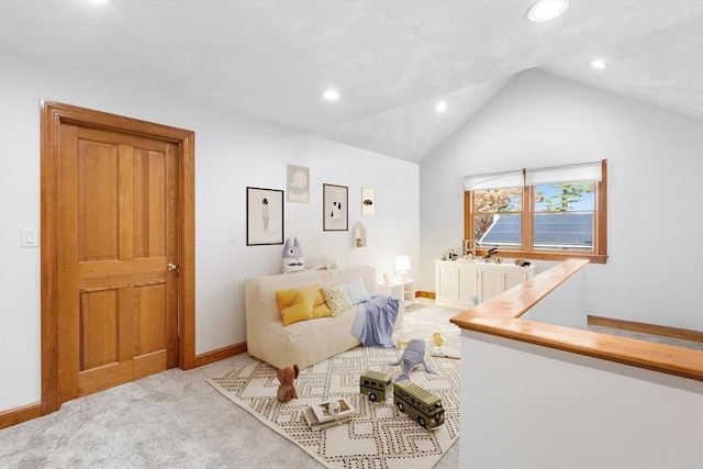 living area featuring light colored carpet and lofted ceiling